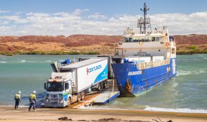 Centurion loaded seven refrigerated trailers of produce on to a barge at Dampier port